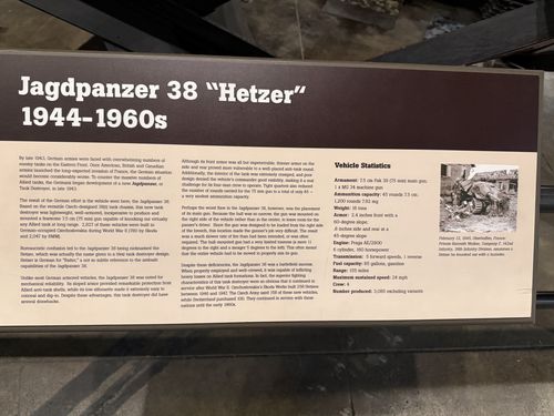 Long placard titled 'Jagdpanzer 38 "Hetzer" 1944-1960s' with body text and a 'Vehicle Statistics' sidebar plus a small WWII photo of a knocked-out Hetzer.